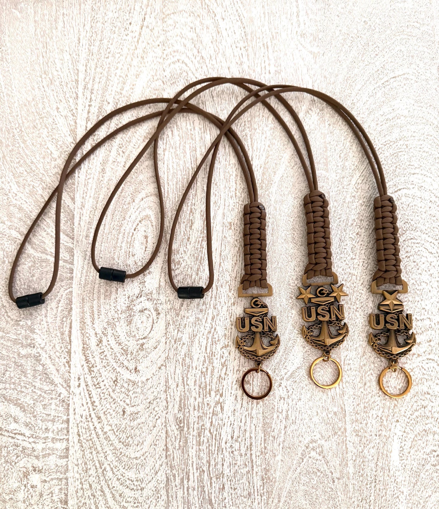 USN E7/E8/E9 Antique Gold Anchors with Coyote Brown Paracord Lanyard.